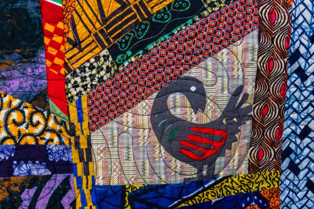 Quilt by Ed Johnetta Miller feat Sankofa and tribal African patterns